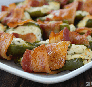 Bacon Wrapped Jalapeño Popper Halves are perfect for game day, potlucks and parties. With 2 unexpected ingredients, these will fly off the table!
