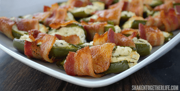 Bacon Wrapped Jalapeño Popper Halves are perfect for game day, potlucks and parties. With 2 unexpected ingredients, these will fly off the table!