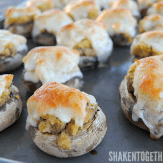 With only 3 ingredients, Cheesy Stuffing Stuffed Mushrooms are an easy game day or Thanksgiving appetizer!