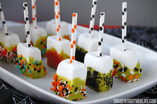 Quick and easy Halloween Marshmallow Pops - perfect for parties, classroom treats and in the kitchen with the kiddos!