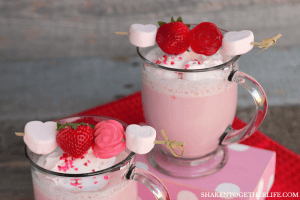Cupid Cocoa - this is SO cute! Strawberry cocoa topped with whipped cream, sprinkles and a yummy kabob loaded with marshmallows, berries and gummy roses!