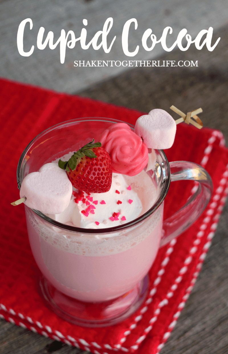 Cupid Cocoa (or strawberry cocoa) is such a fun drink for Valentine's Day! LOVE those sweet kabobs on top!
