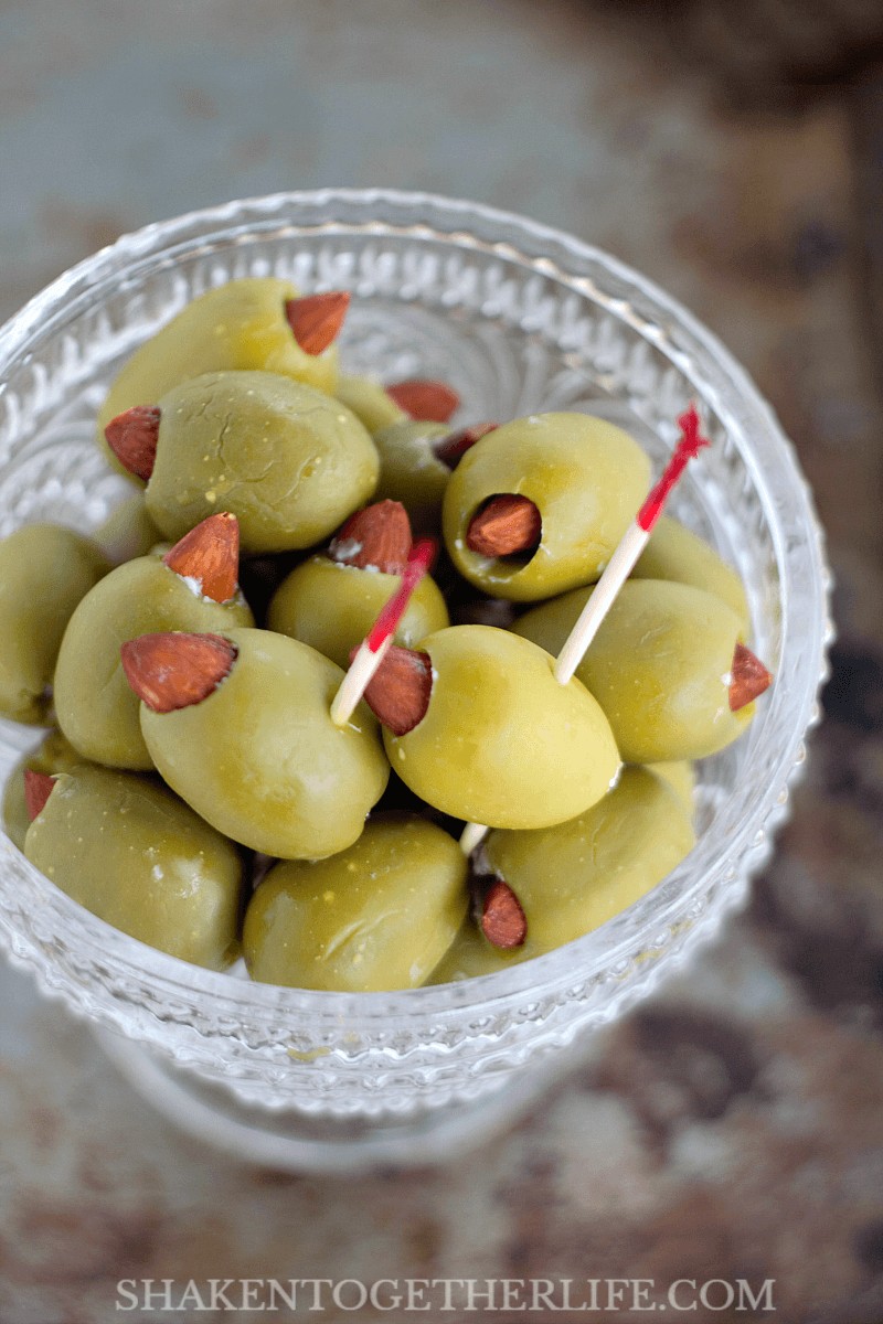 Almond & Blue Cheese Stuffed Olives are totally addictive! Easy appetizer for a cheese board or your game day spread!
