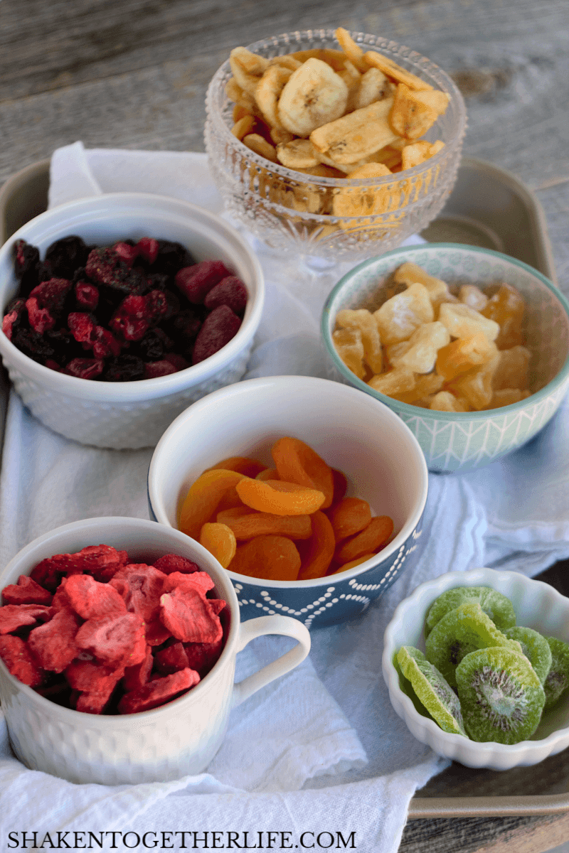 Rainbow Fruit Cheesecakes in a Jar - these no bake cheesecakes wouldn't be the same without colorful dried fruit