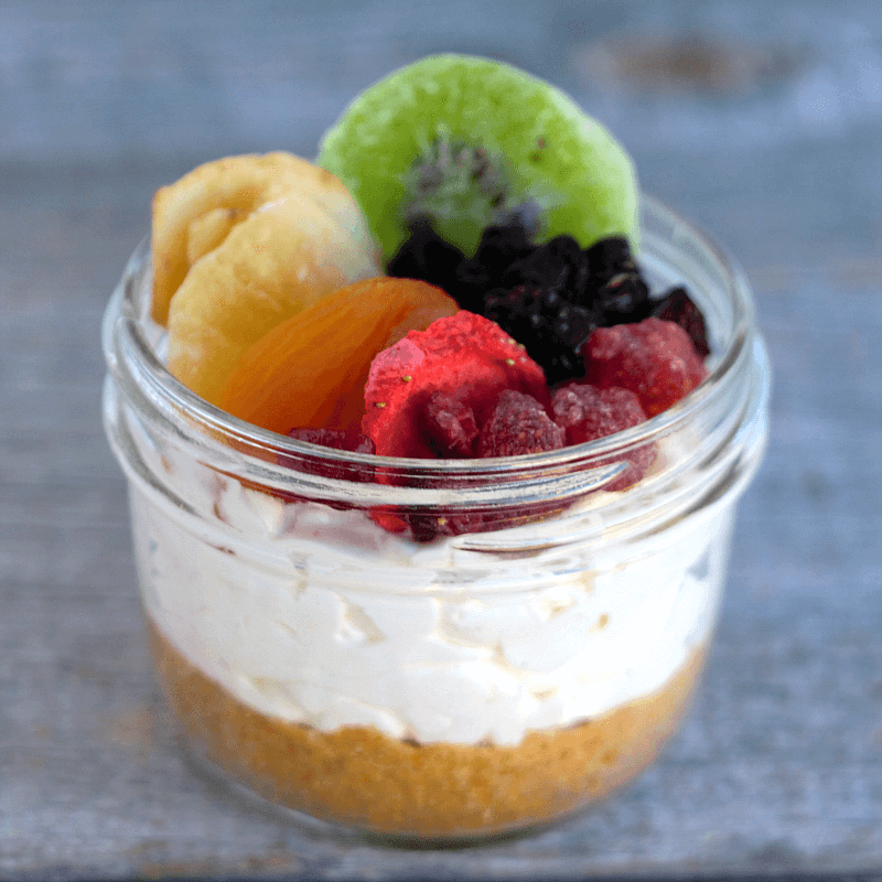 Rainbow Fruit Cheesecakes in a Jar - these no bake cheesecakes are topped with loads of colorful dried fruit!