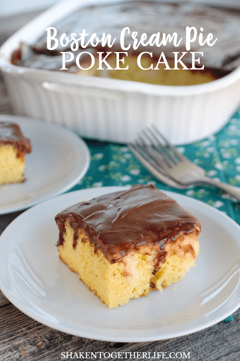 Boston Cream Pie Poke Cake on a white plate