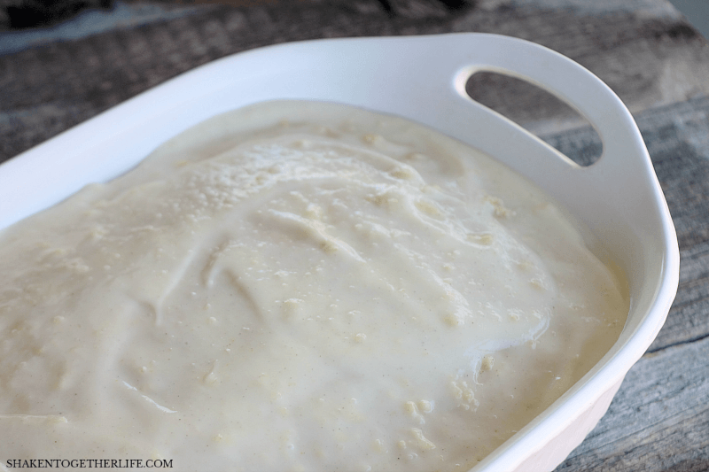 Boston Cream Pie Poke Cake mix in white dish