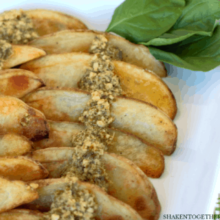 Pesto Potato Wedges are a simple, delicious side dish! Pair them with a steak or serve alongside a salad!