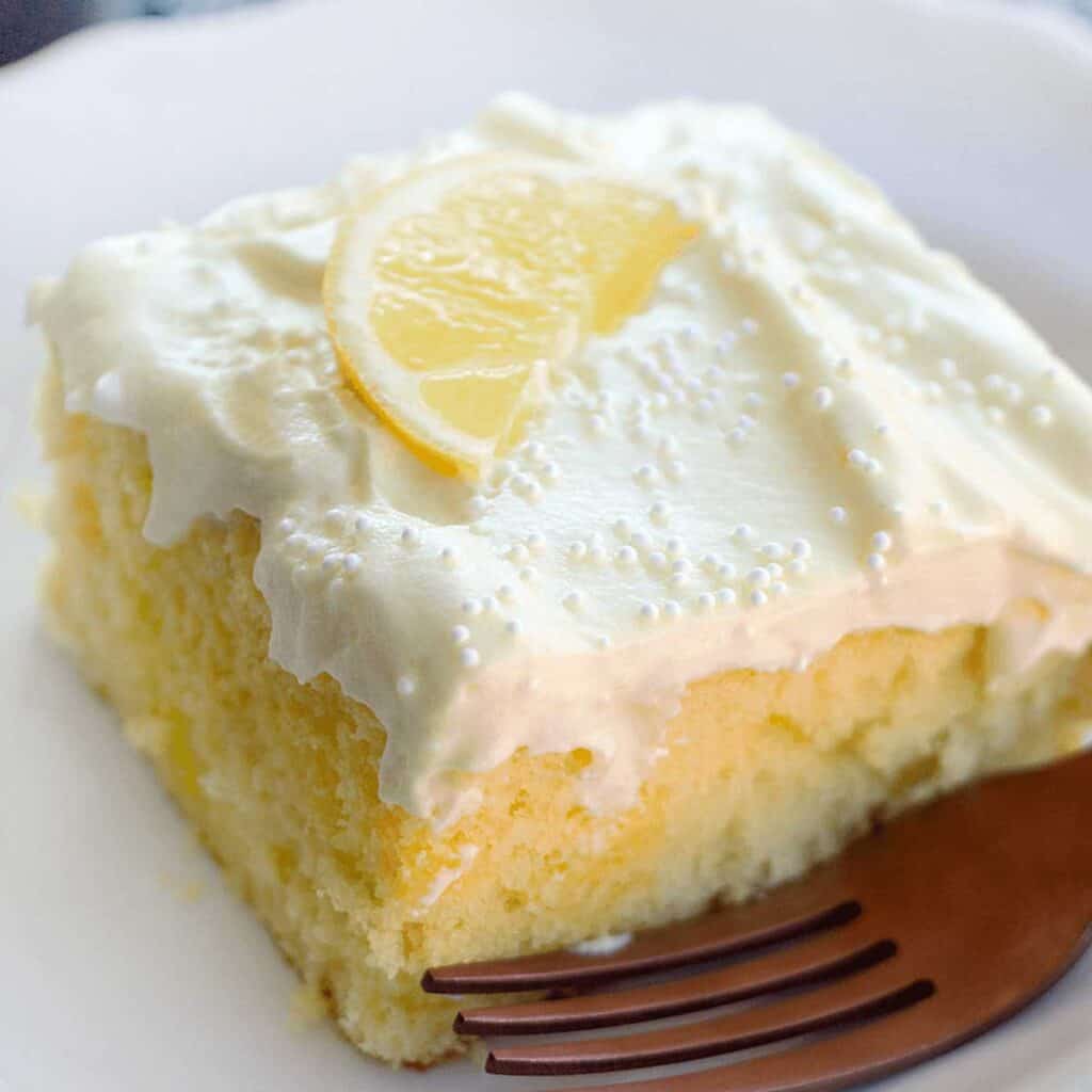 slice of lemon poke cake