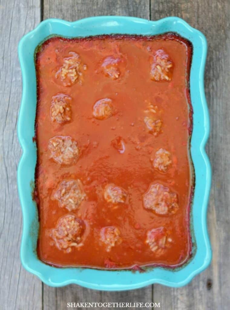 porcupine meatballs in sauce in baking dish