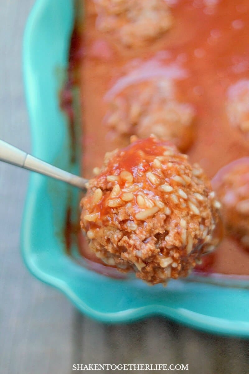 close up of spoon holding Classic Porcupine Meatballs