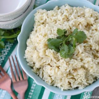 Simple Butter Cilantro Rice in w light blue bowl with two forks