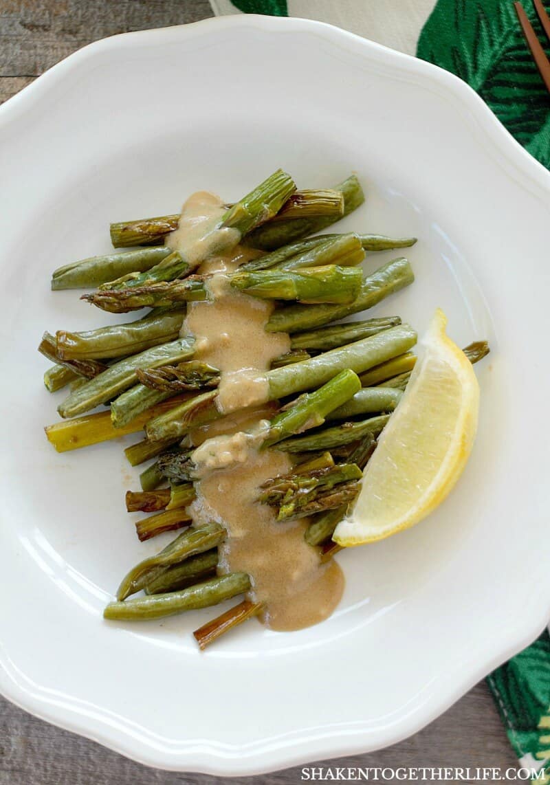 Roasted Vegetables with Garlic Dijon Sauce on white plate