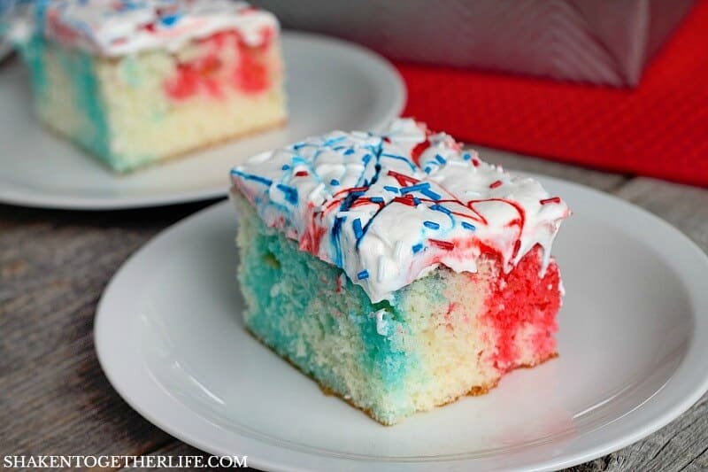 red white and blue poke cake on white plate