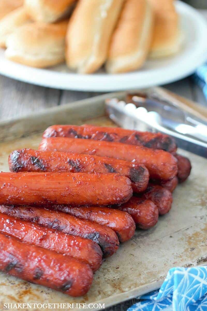 Grilled BBQ Glazed Smoked Sausage on baking sheet