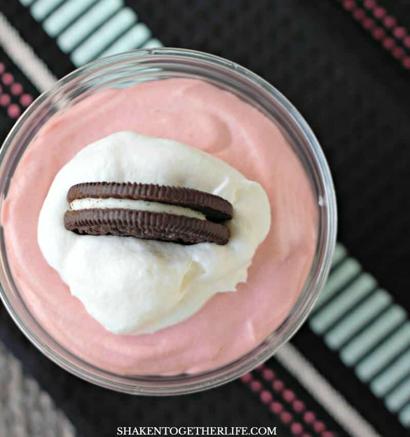 Oreo Red Velvet Pudding Cups! Fluffy red velvet pudding mousse, crushed oreos and whipped topping are layered in this easy, no bake dessert!