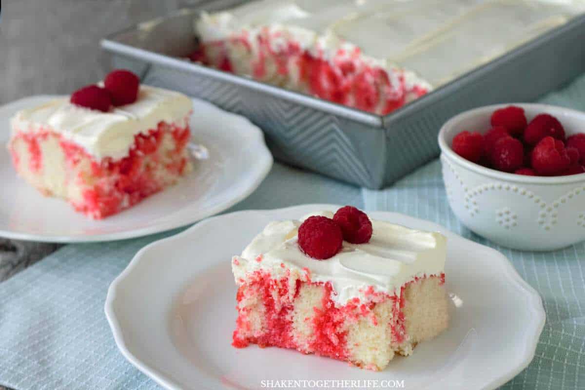 Raspberry Poke Cake is an easy make ahead fruity dessert that is perfect for parties and get togethers!