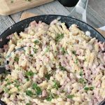 With just a few basic ingredients from your kitchen, this Skillet Ham & Cheese Alfredo comes together quickly! Who can resist pasta and cheese?!