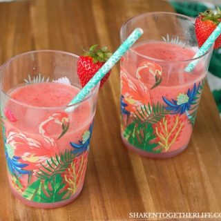 Tropical and fruity and oh so simple, our family loves these 2 ingredient Strawberry Orange Smoothies!