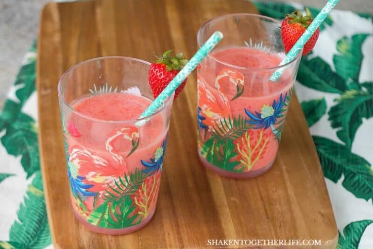 Tropical and fruity and oh so simple, our family loves these 2 ingredient Strawberry Orange Smoothies!