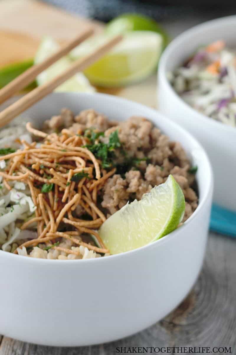 Korean Turkey Rice Bowls are filled with flavorful seasoned ground turkey, nutty brown rice, shredded cabbage and topped with crispy noodles for a quick and tasty weeknight meal!