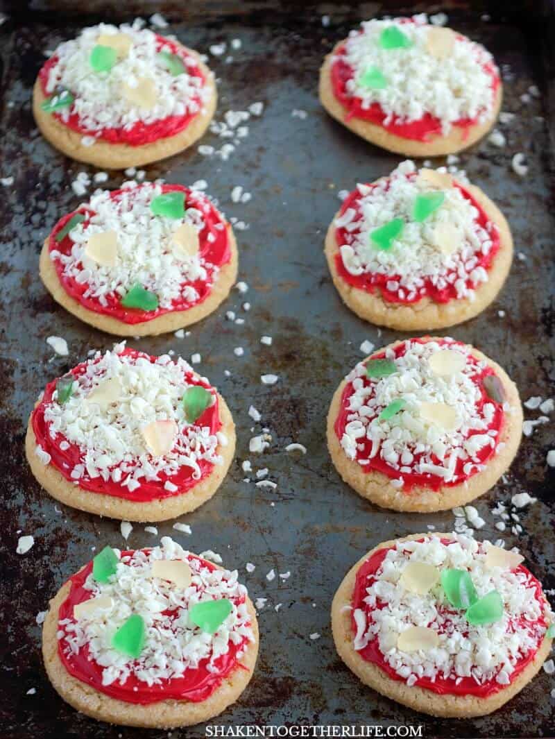 Chopped gummy worms (gummy bears work too) are the peppers and onions on these Sugar Cookie Pizza Cookies!