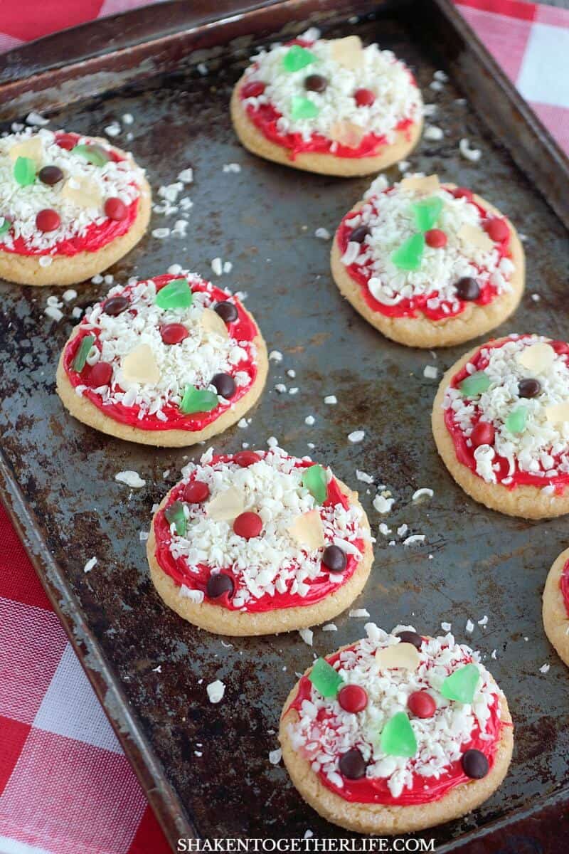 Mini M&Ms are the pepperoni and sausage on these loaded Sugar Cookie Pizza Cookies!