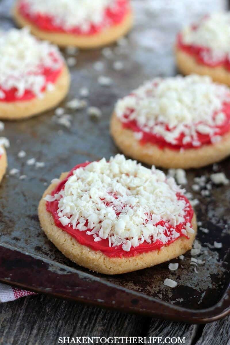 Grate a white chocolate bar for the cheese on these super cute Sugar Cookie Pizza Cookies!