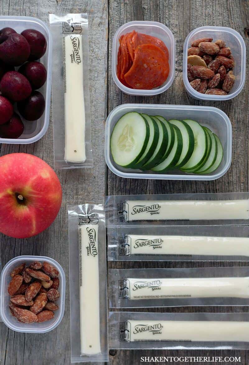 Prep and pack these Quick & Easy Snacks for the Office in no time - string cheese, fruit, nuts, veggies & more! Great snack ideas for adults!