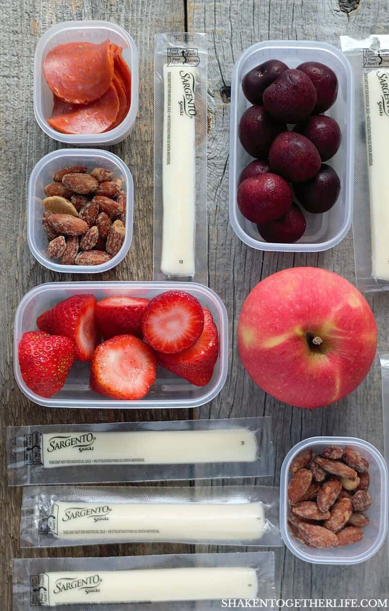 Prep and pack these Quick & Easy Snacks for the Office in no time - string cheese, fruit, nuts, veggies & more! Great snack ideas for adults!