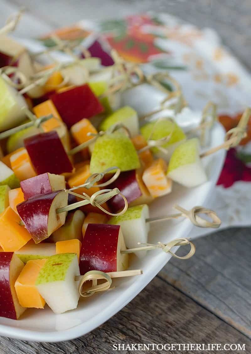Sharp Cheddar & Colby-Jack cheese paired with apples and pears make up these Fruit & Cheese Skewers - just 1 of 3 Easy Cheesy Appetizers using cheese sticks!