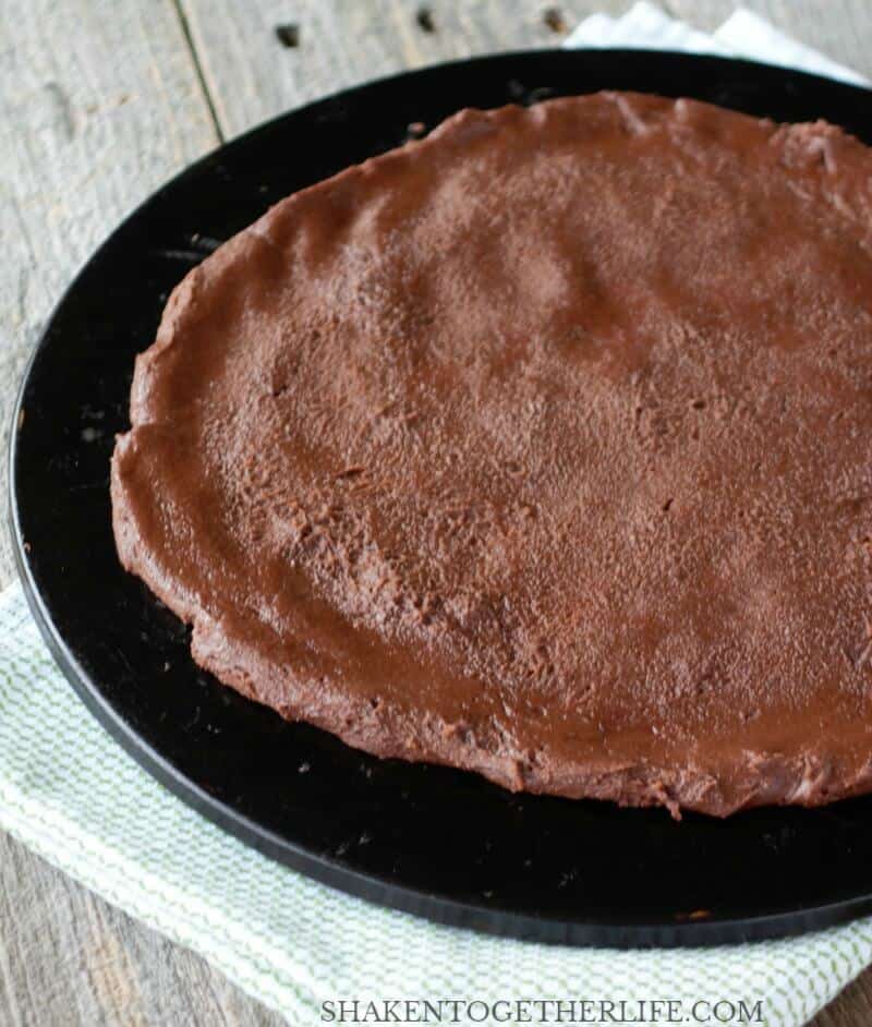 Our Pumpkin Patch Dessert Pizza starts with a rich chocolate brownie crust made from a brownie mix!