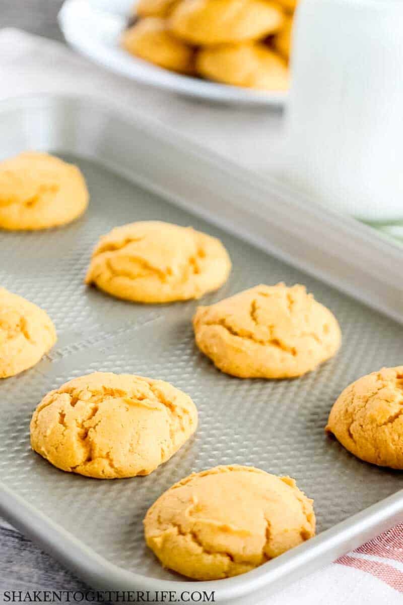pumpkin cookies on baking sheet