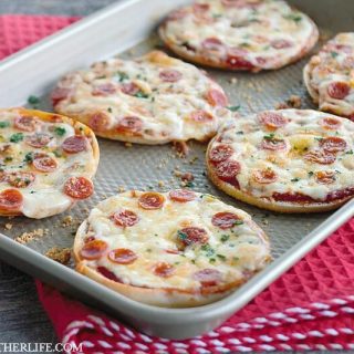 Done in minutes and easy to personalize with your favorite pizza toppings, these Thin Crust Bagel Pizzas are the perfect easy dinner idea!