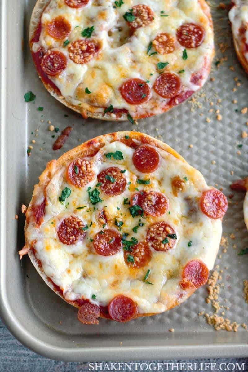 Pizza lovers rejoice! These Thin Crust Bagel Pizzas can be loaded with your favorite pizza toppings and have the perfect ratio of crust to toppings!