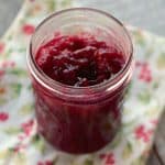 Homemade Orange Cranberry Sauce adds the perfect fruity, tangy topping for these No-Bake Mini Cranberry Cheesecakes!