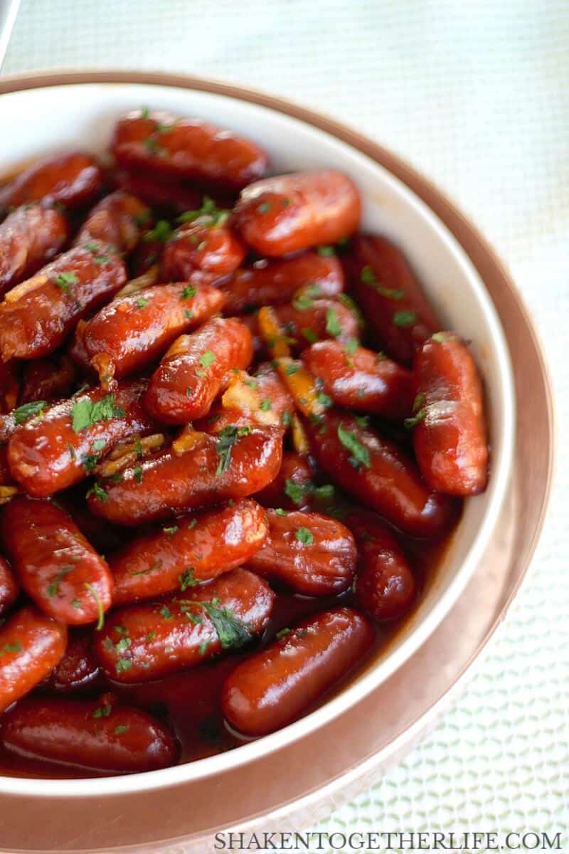 With just 3 ingredients, these Orange BBQ Little Smokies are a deliciously easy appetizer for the holidays, New Years Eve or the big game! You can make them on the stove top or in your slow cooker!