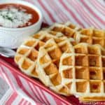 Pizza Stuffed Waffles start with refrigerated biscuits then stuffed with creamy mozzarella, mini pepperoni and are waffled to perfection in about 5 minutes flat! What an easy dinner idea!