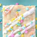 close up of cookie. bar with sprinkles and text reading funfetti cookie bars