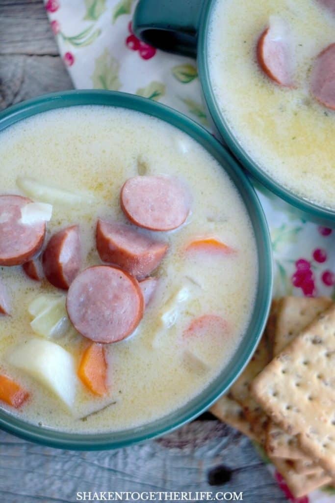 Grandma's Creamy Sausage & Potato Soup close up in green bowl