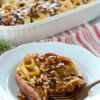 This Overnight Waffle Breakfast Casserole with Brown Sugar Pecan Sauce is perfect for holiday breakfast! Make it the night before, pop it in the oven and wake up your family to the scents of vanilla, cinnamon & syrup!