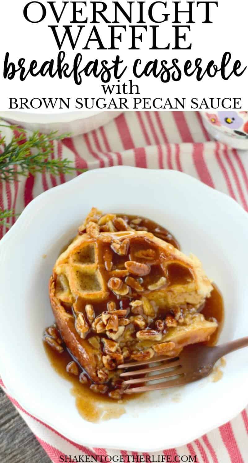 Overnight Waffle Breakfast Casserole with Brown Sugar Pecan Sauce on white plate with read and white napkin and fork