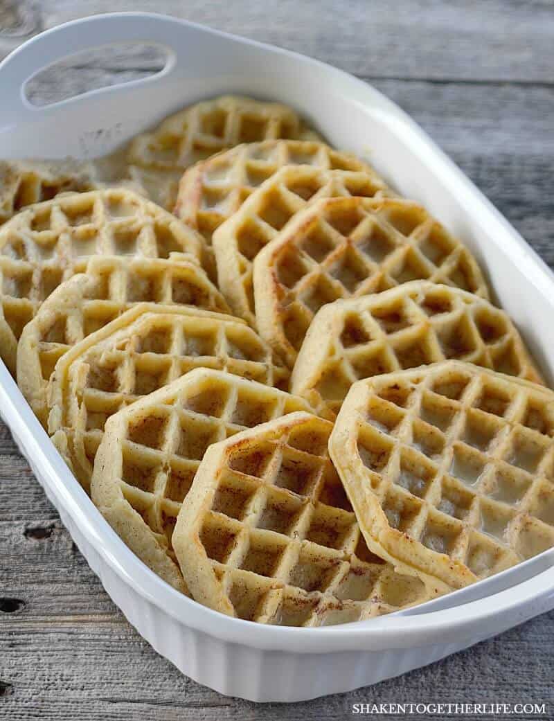 Overnight Waffle Breakfast Casserole in a white casserole dish