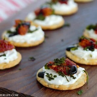 With just 5 ingredients and no cooking required, these easy flavorful Cream Cheese Caprese Cracker Bites are the perfect holiday appetizer!