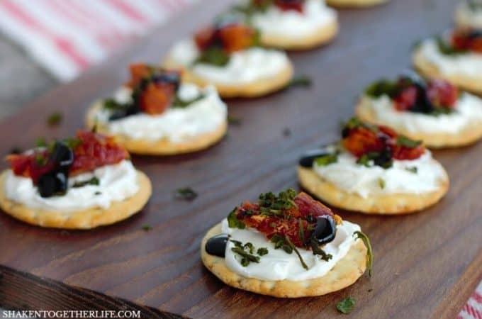 With just 5 ingredients and no cooking required, these easy flavorful Cream Cheese Caprese Cracker Bites are the perfect holiday appetizer!
