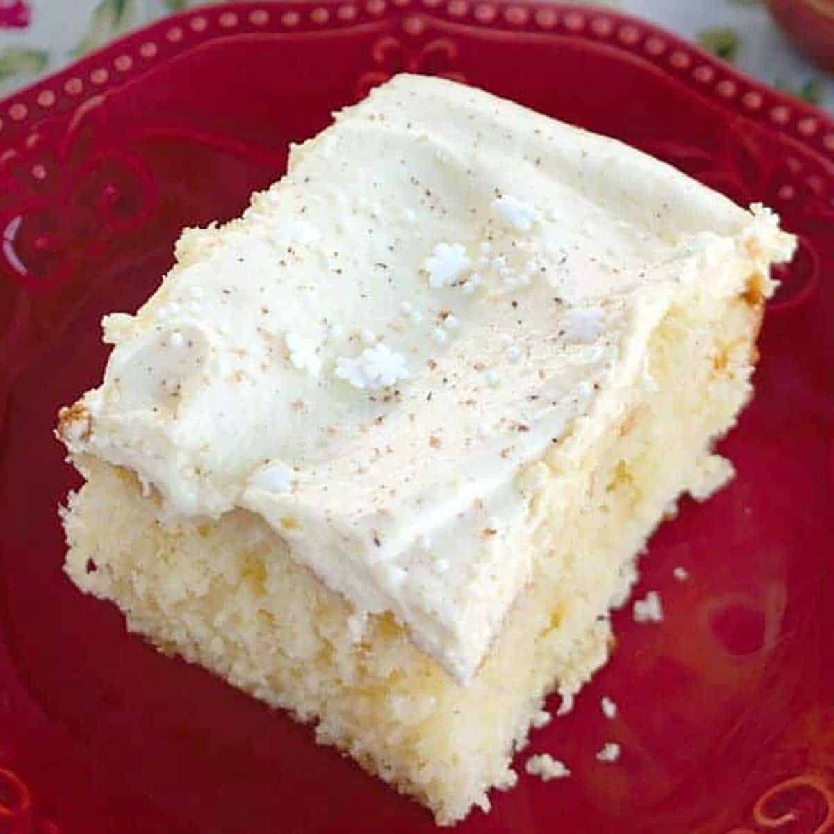 piece of eggnog cake on red plate