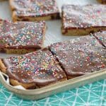 These Frosted Sheet Pan Cookie Bars make dessert quick and easy! You will love the frosting hack, too!