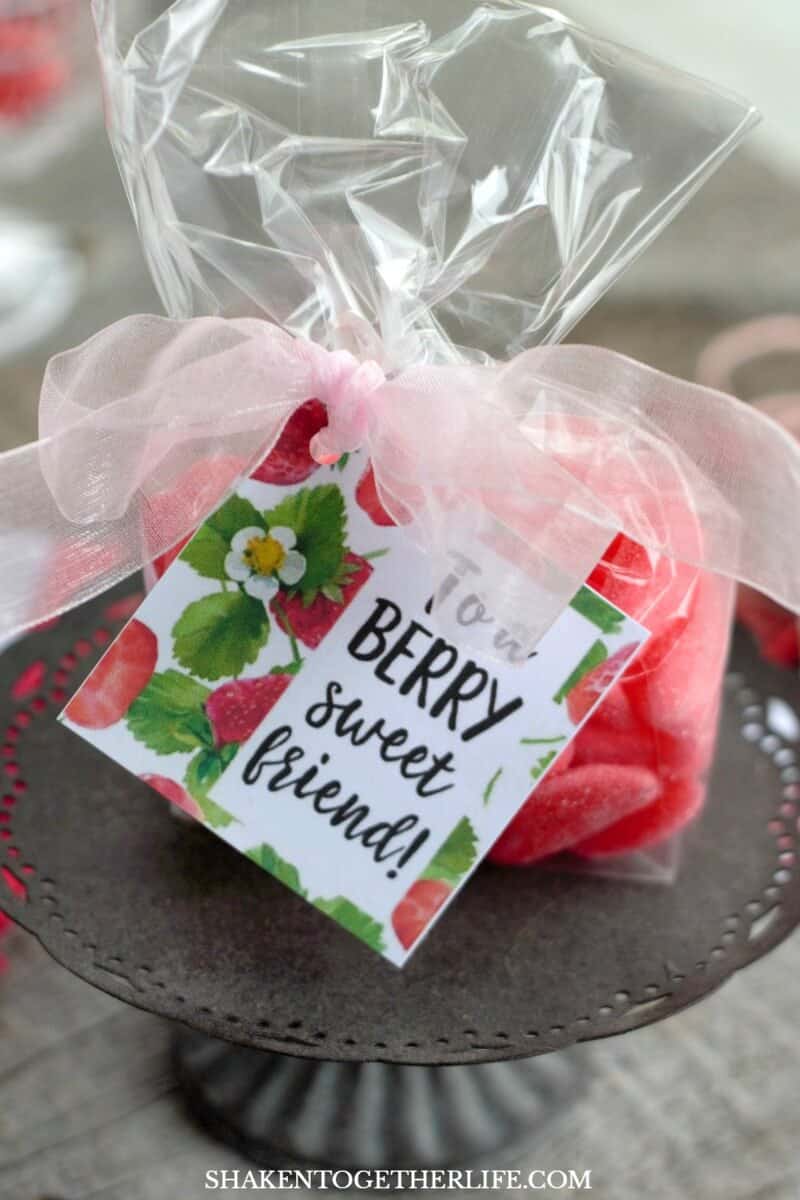Strawberry Themed Gifts + Berry Sweet Printable Tags - a bag of sour strawberry hearts is one of a long list of strawberry themed gifts!