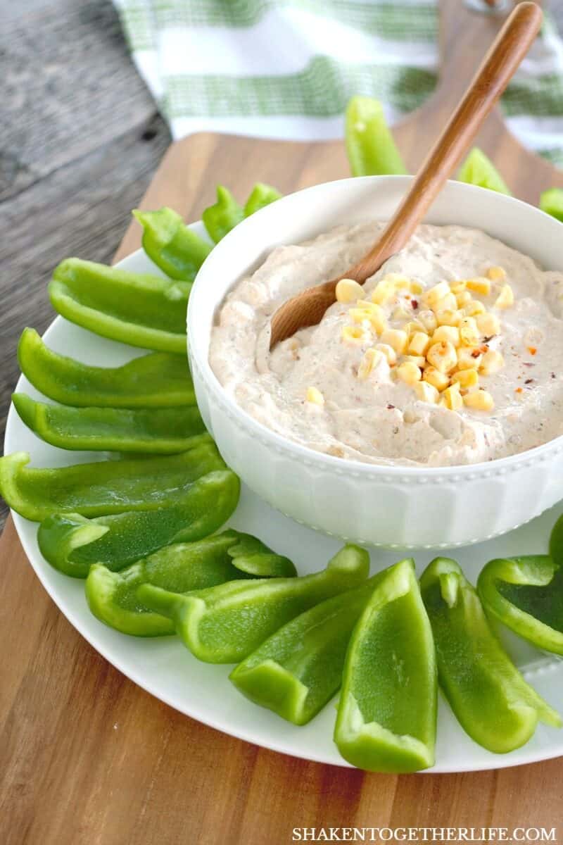 This Creamy Chipotle Ranch Dip with Bell Pepper Chips starts with a sour cream based dip filled with ranch, a kick of chipotle and surprising pop from sweet corn. Lighten up your dipping with fresh, crispy bell pepper chips, too!