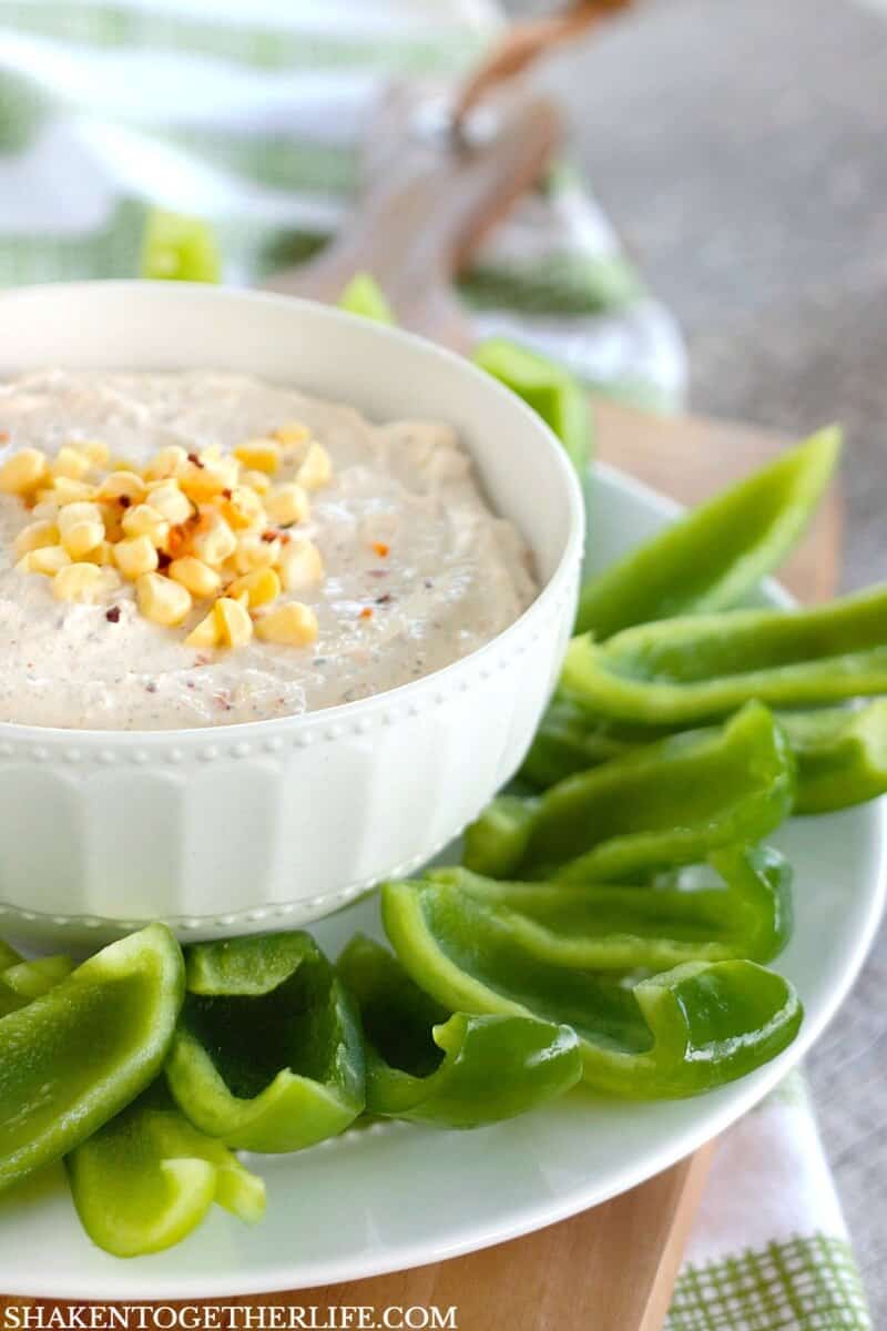 This Creamy Chipotle Ranch Dip with Bell Pepper Chips starts with a sour cream based dip filled with ranch, a kick of chipotle and surprising pop from sweet corn. Lighten up your dipping with fresh, crispy bell pepper chips, too!